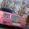 Strip-tease limousine rose Paris